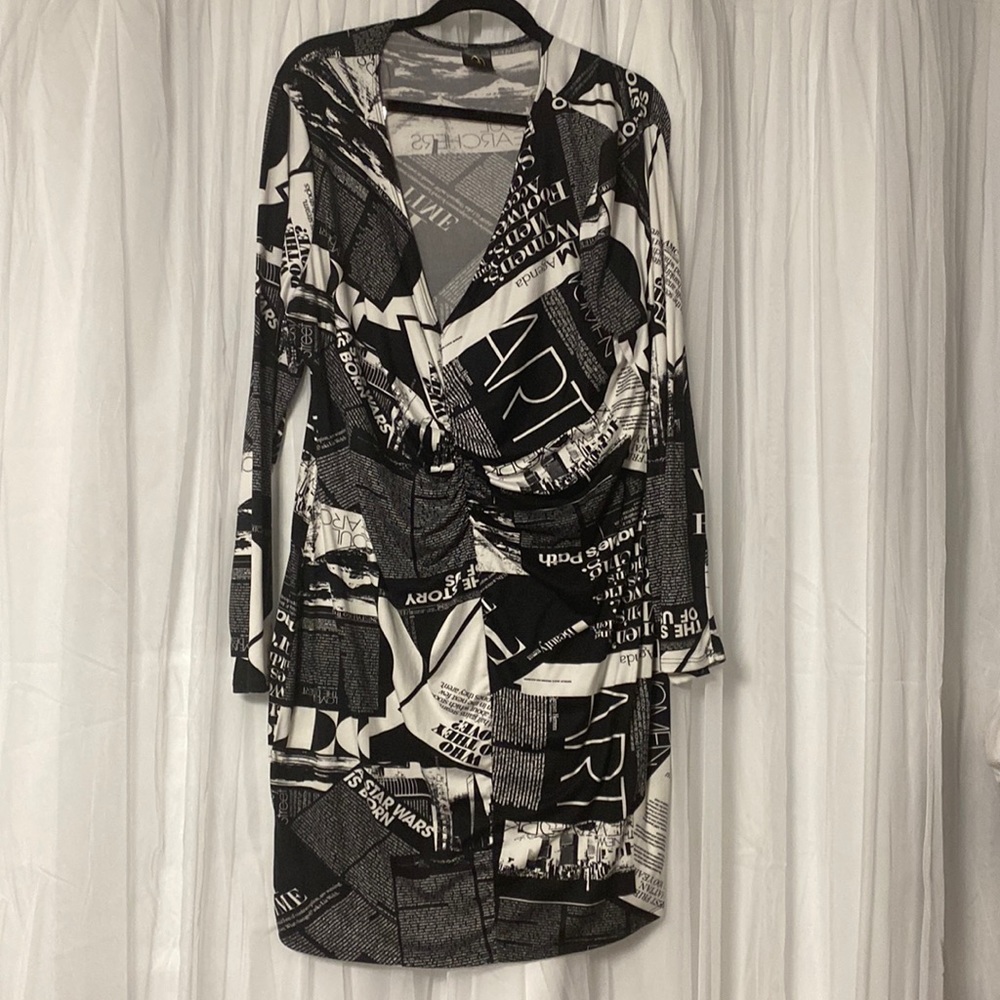 Size 3x news paper dress. New without tags